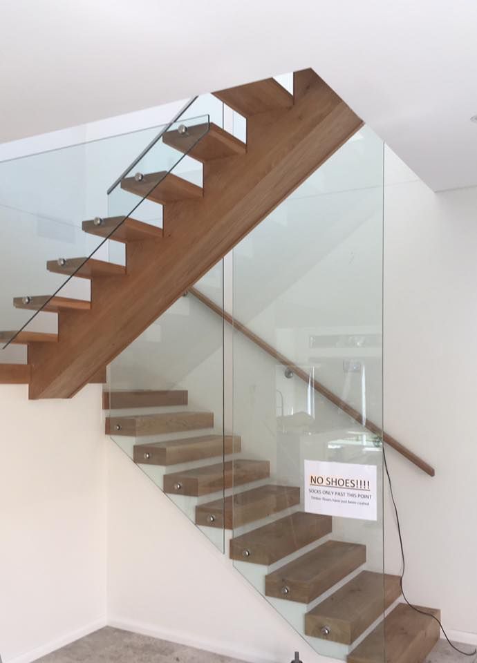 A Staircase With A Sign That Says No Shoes On It — Frameless Shower Installations In Caloundra, QLD