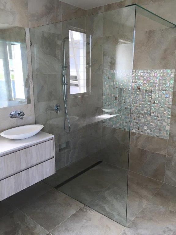 A Bathroom With A Walk In Shower , Sink And Mirror — Frameless Shower Installations In Maroochydore, QLD