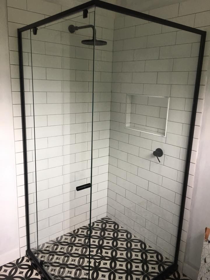 A Shower Stall With A Black Frame And White Tiles — Frameless Shower Installations In Caloundra, QLD
