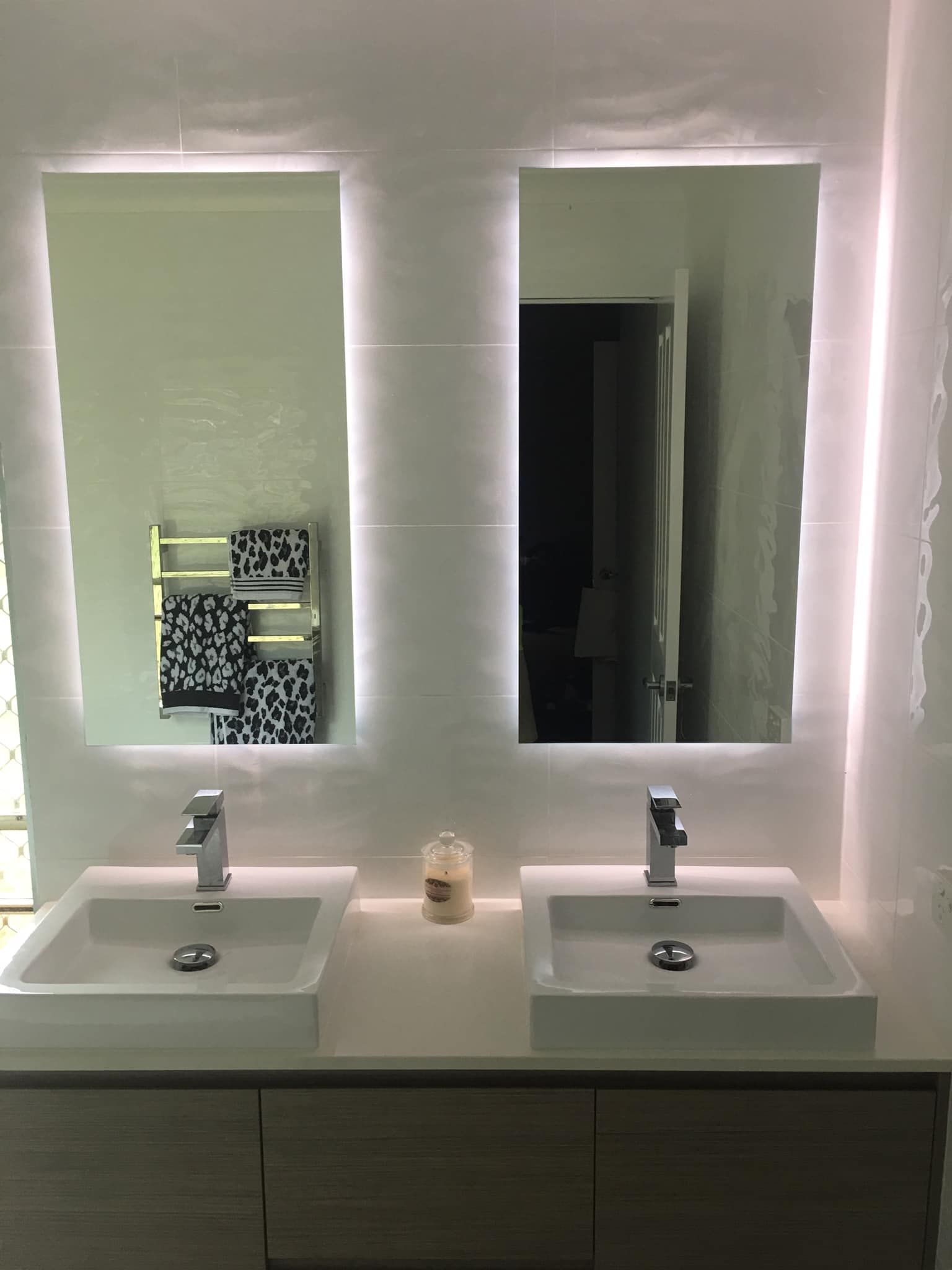 A Bathroom With Two Sinks and Two Mirrors — Frameless Shower Installations In Maroochydore, QLD 