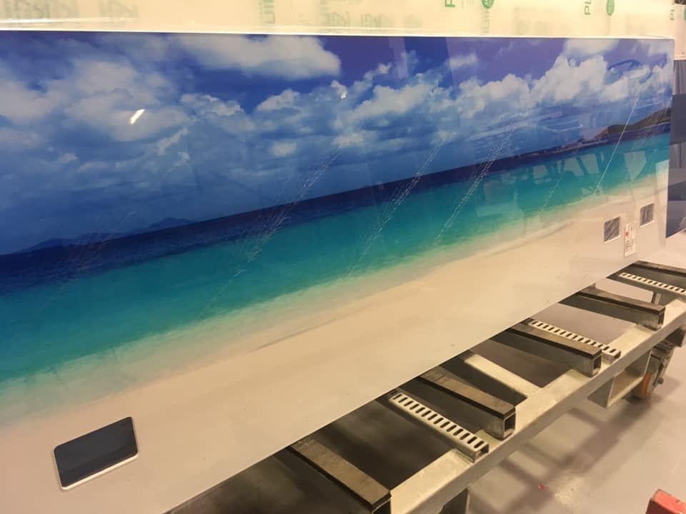 There is a Picture of a Beach on the Wall — Frameless Shower Installations In Maroochydore, QLD 