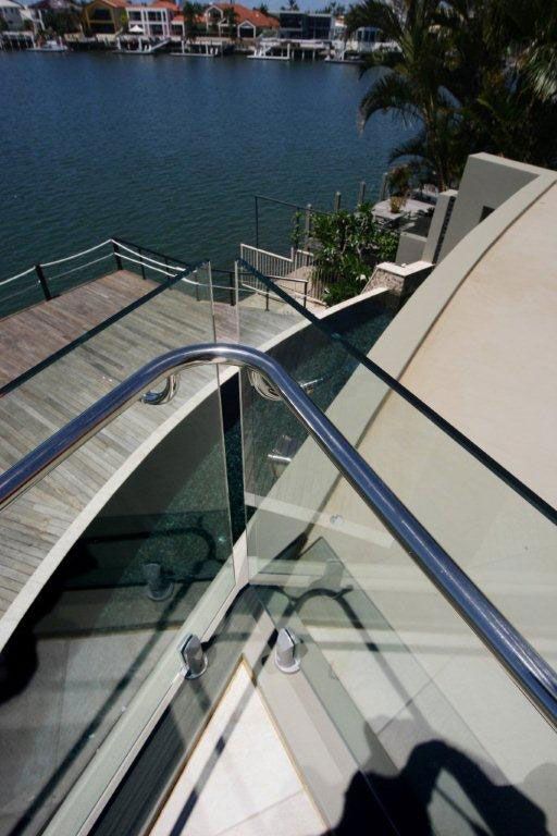 A Bathroom With a Shower Stall and a Bathtub — Frameless Shower Installations In Maroochydore, QLD 