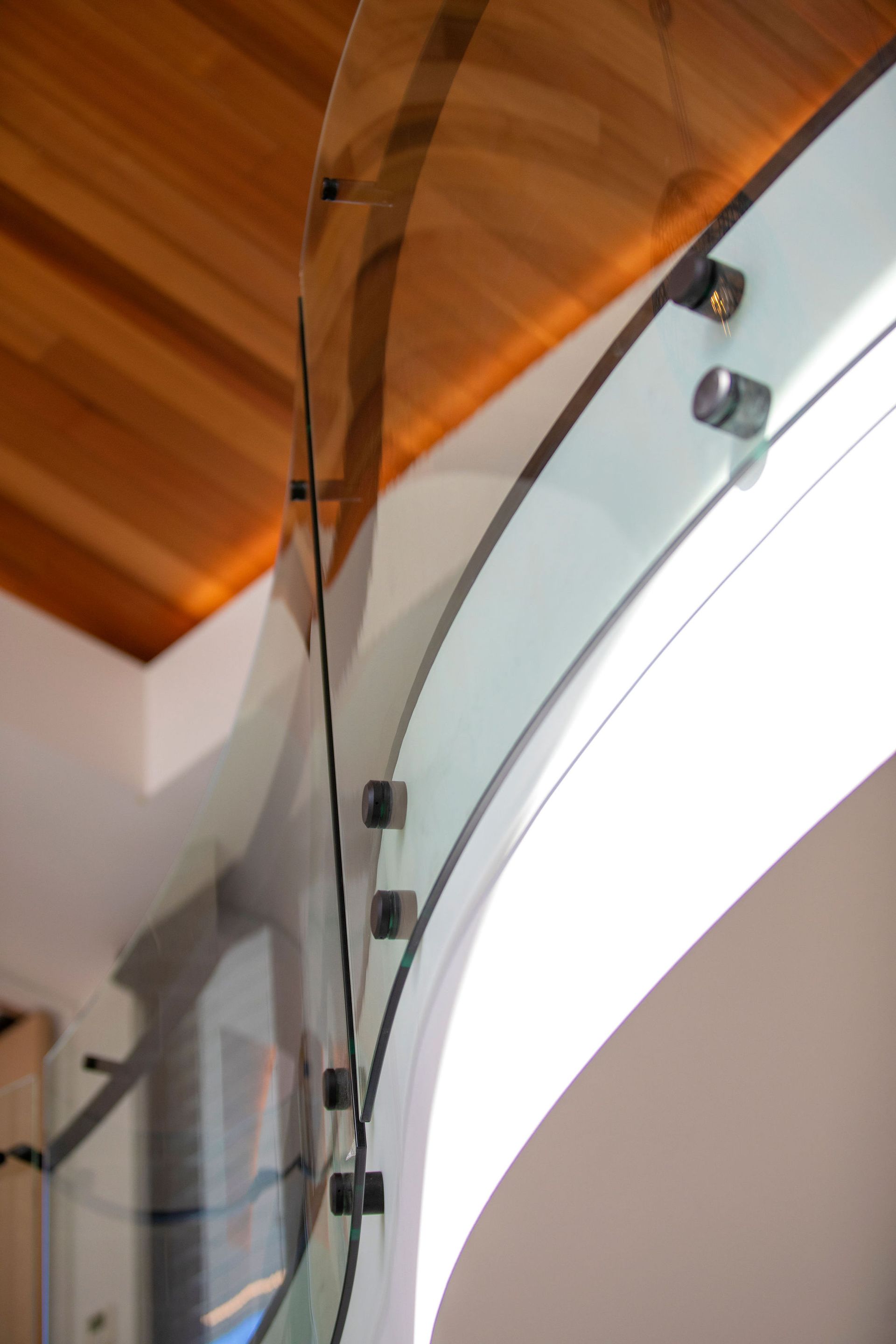 A Close Up of a Glass Railing on a Staircase — Frameless Shower Installations In Maroochydore, QLD 