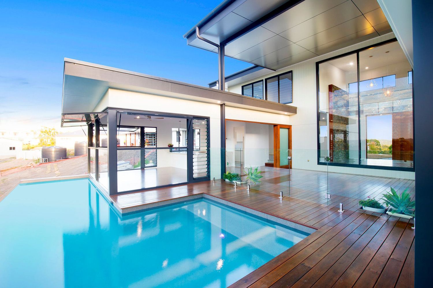 Modern Home With A Pool With Glass Fencing