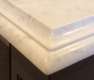 A Close up Of a White Marble Counter Top on A Kitchen Counter — Sheridan Stone Aust in Toormina, NSW