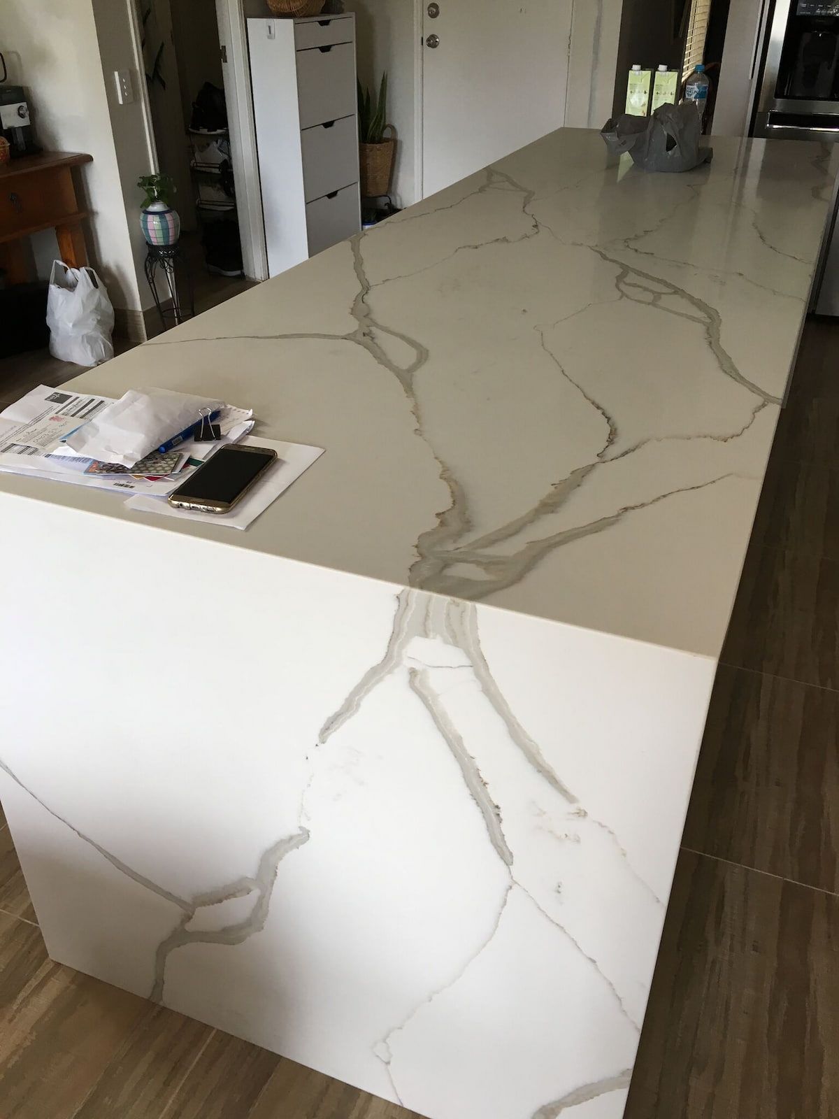 A Large White Marble Counter Top in A Kitchen — Sheridan Stone Aust in Toormina, NSW