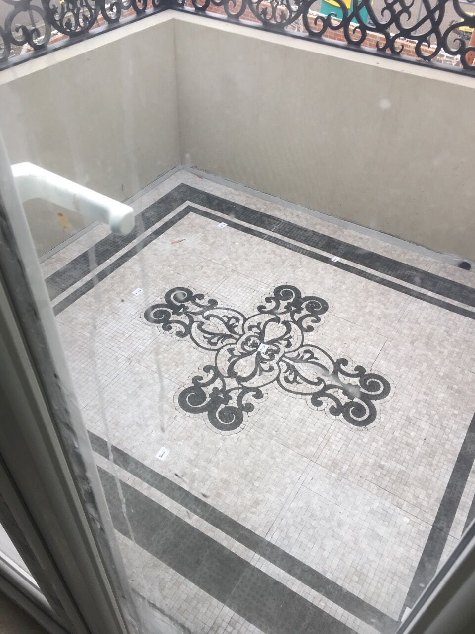 A Marble Floor with A Cross Design on It — Sheridan Stone Aust in Kempsey, NSW