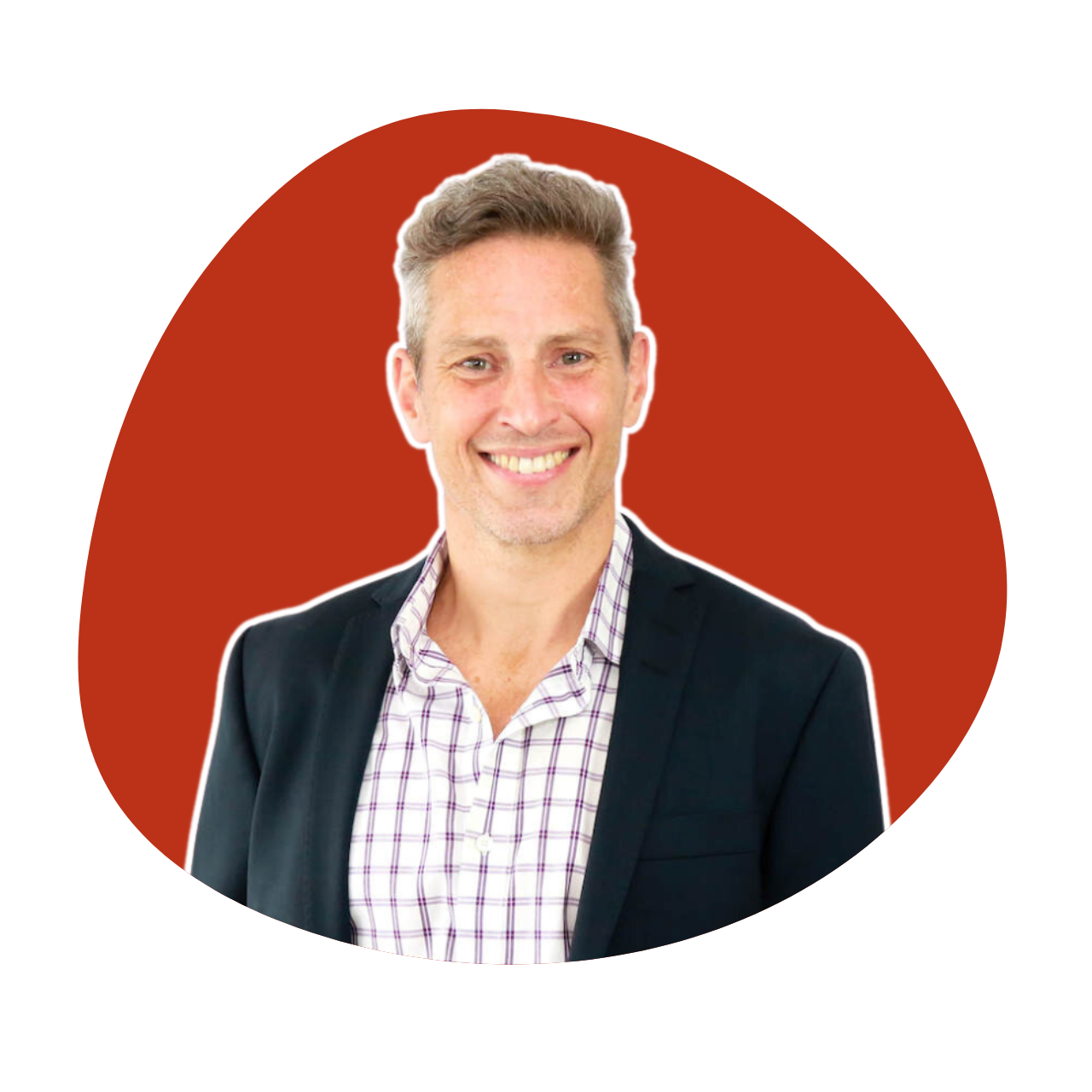 A man with curly hair is smiling in a red circle