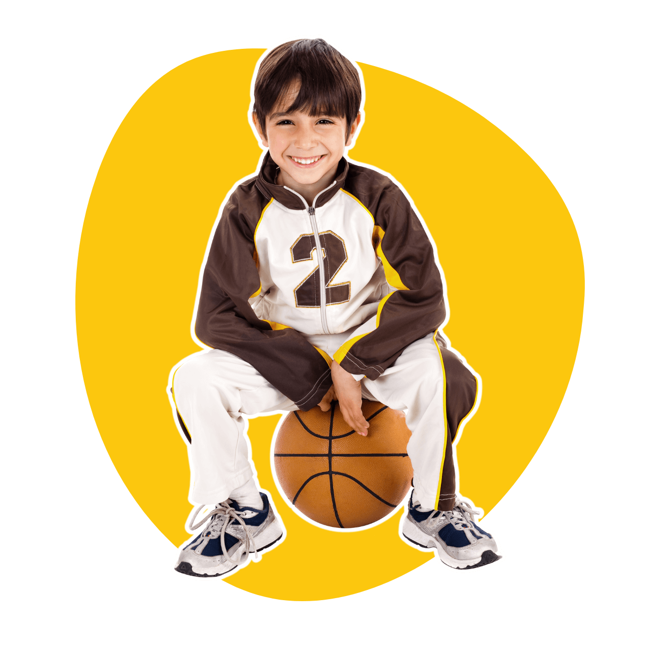 A young boy with the number 2 on his jacket is sitting on a basketball