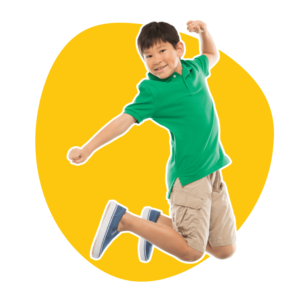A young boy in a green shirt and khaki shorts is jumping in the air because he is happy at school