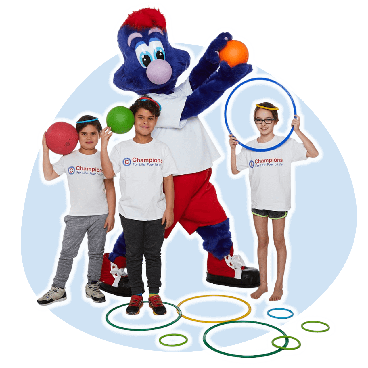 A group of children standing next to a blue mascot