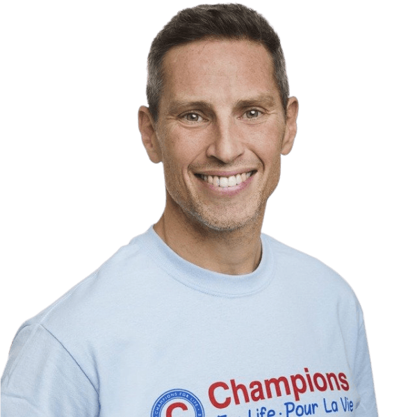 A man wearing a shirt that says champions on it