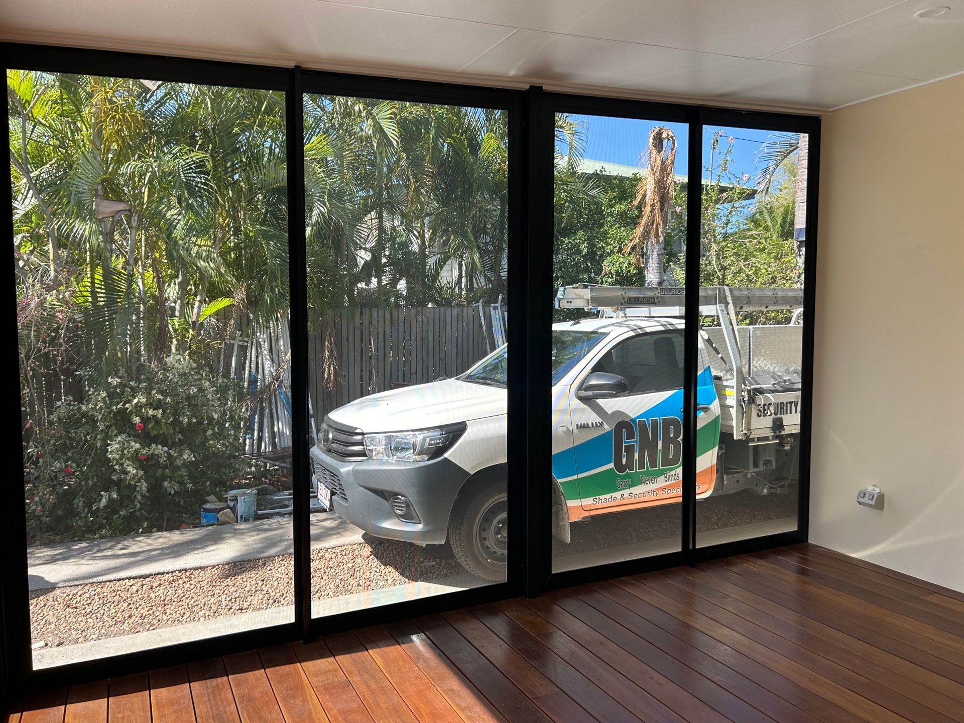 a large house with a swimming pool in front of it