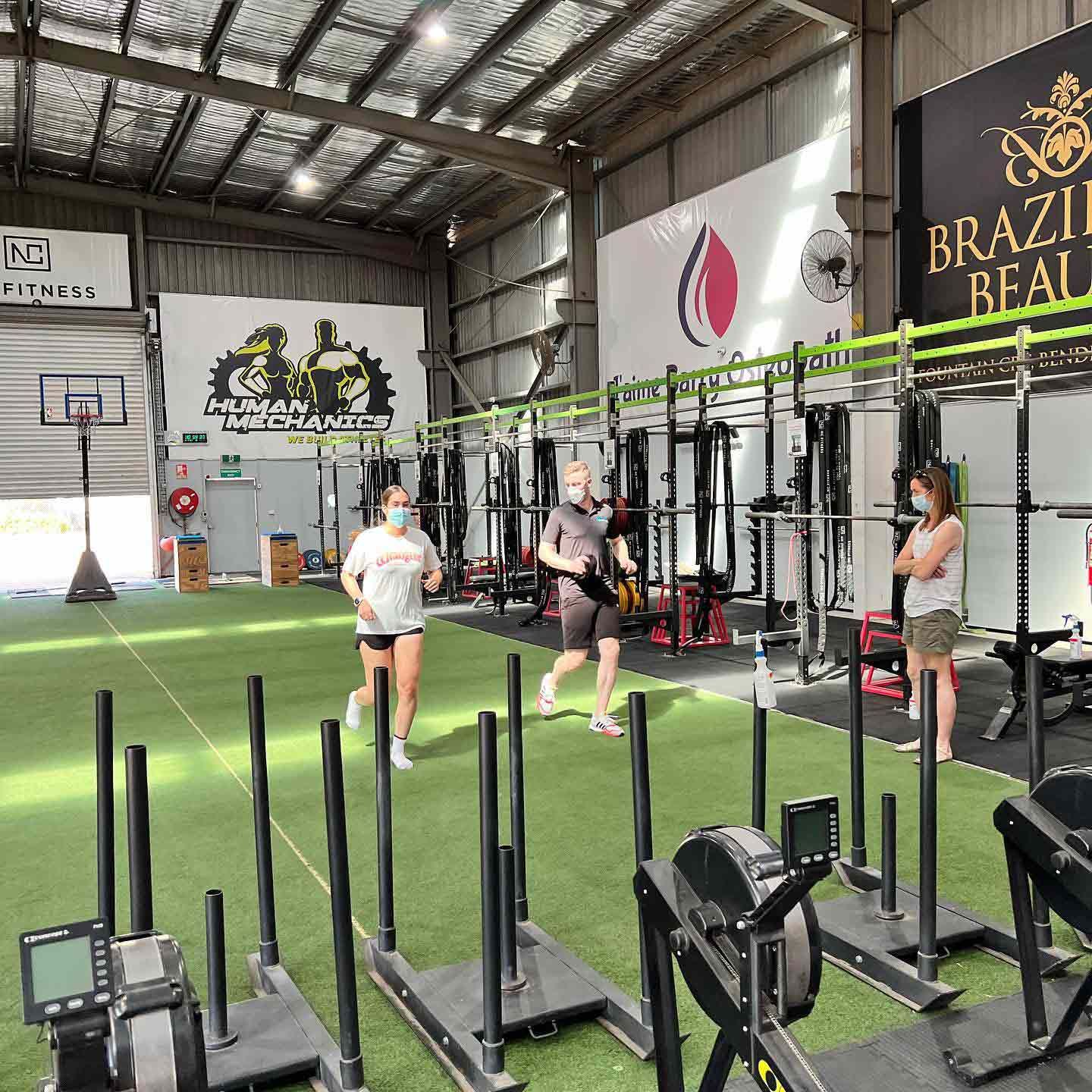 A Group of Individuals Standing in a Gym — Return to Performance Physiotherapy in Epsom, VIC