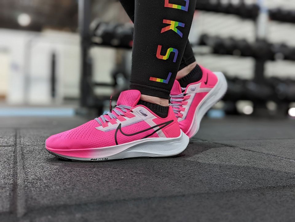 Person is Wearing a Pair of Pink Nike Running Shoes — Return to Performance Physiotherapy in Epsom, VIC
