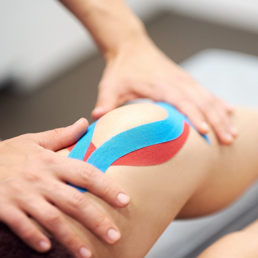 Knee With Colourful Tapes — Return to Performance Physiotherapy In Epsom, VIC