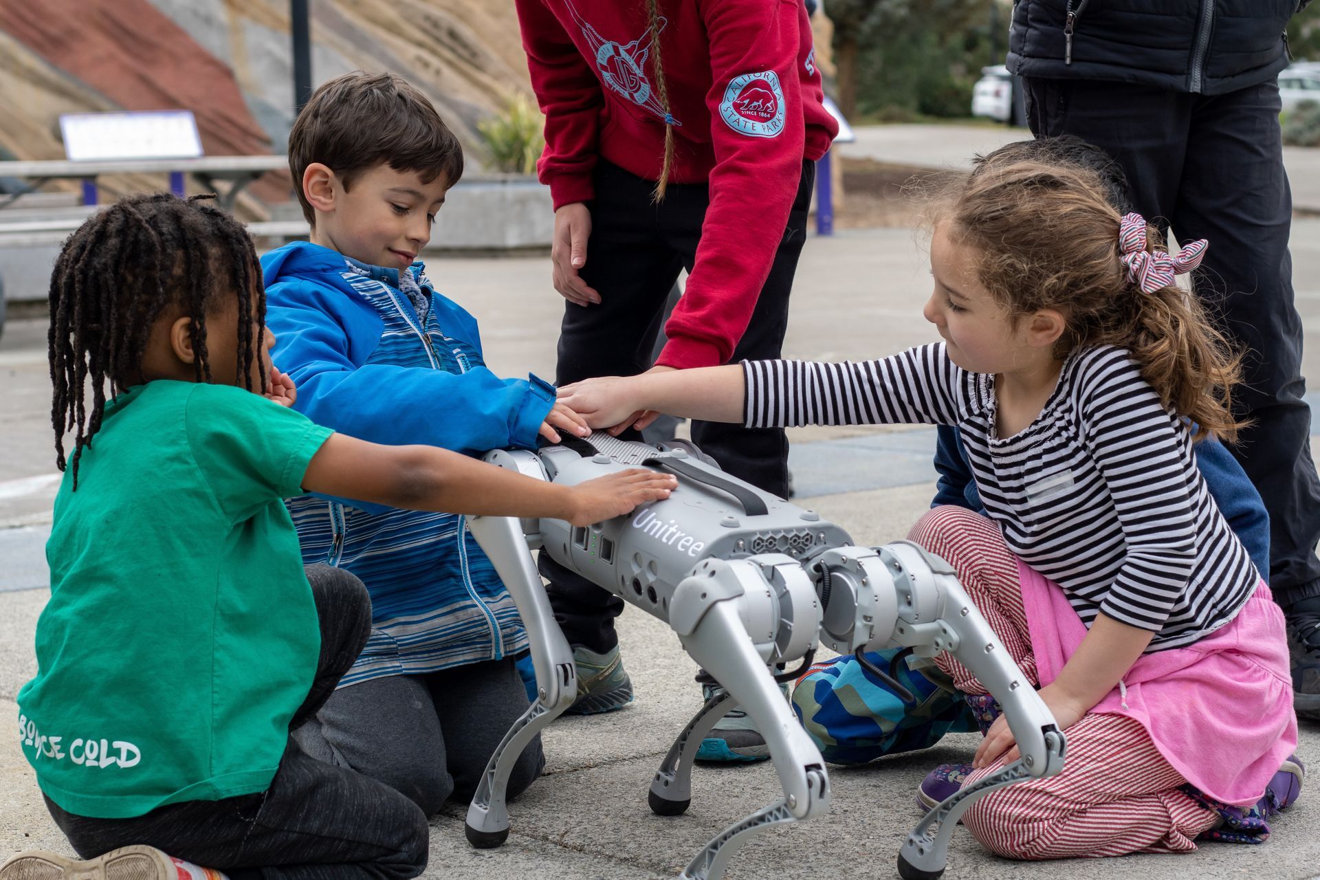 Children pet Cosmo Rover our Robotic Dog at ScienceWorks Museum