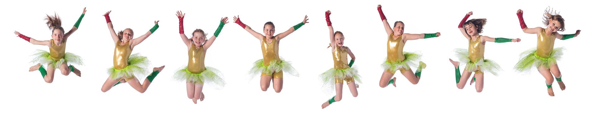 a group of 8 children dancing in matching outfits