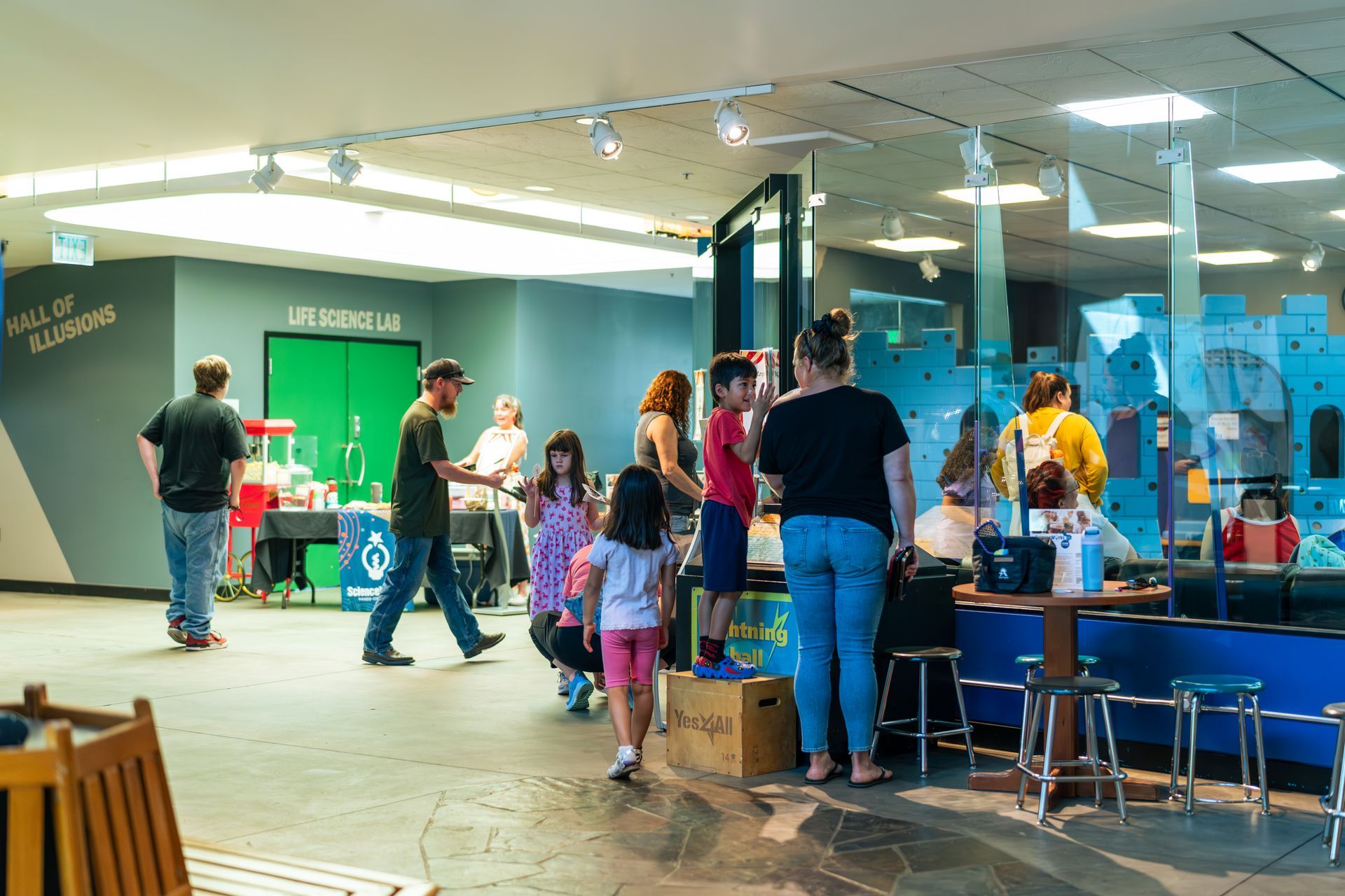 A photo of guests mingling in Kranzler Hall and Pacific Crest Cove
