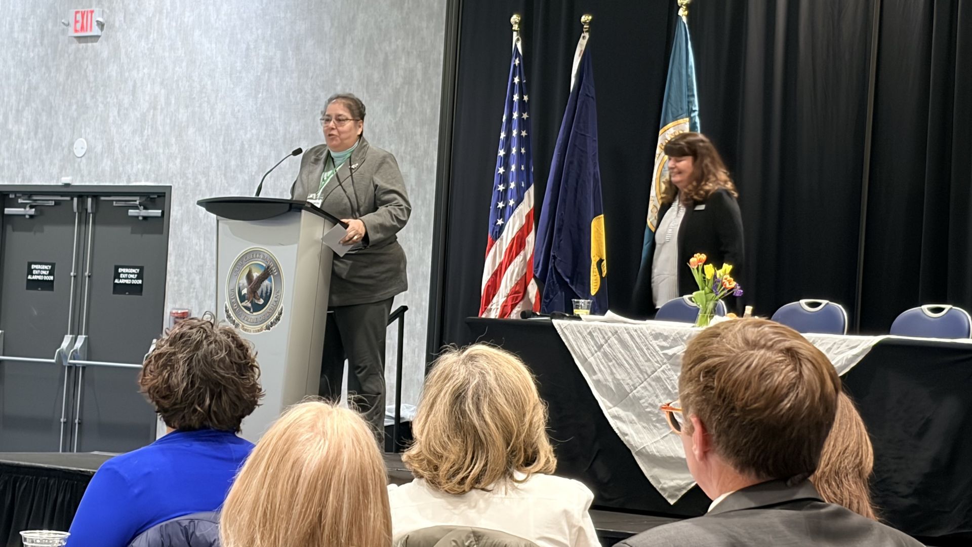 Dr. Gabriela Chavarrria accepts a grant award at the Cow Creel Umpqua Indian Foundation Award ceremo