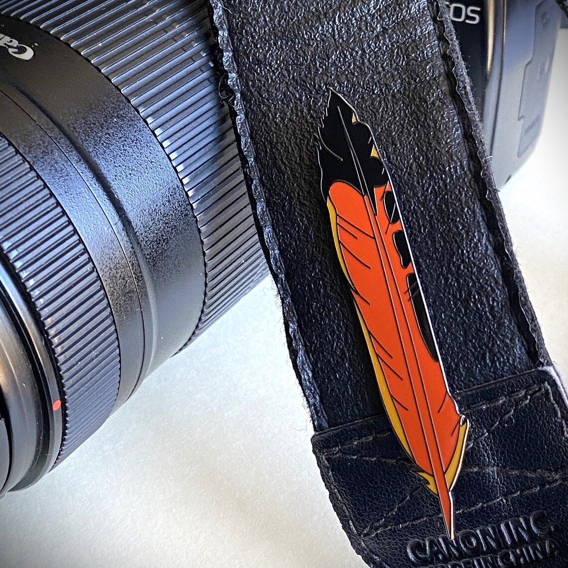 Flicker Feather enamel pin