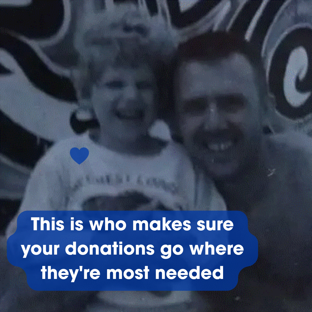 A smiling child and adult posed against a graffiti background, with text overlay that says,