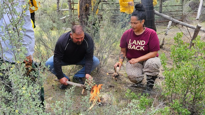 Photo of Lomakatsi staff initiating a cultural burn