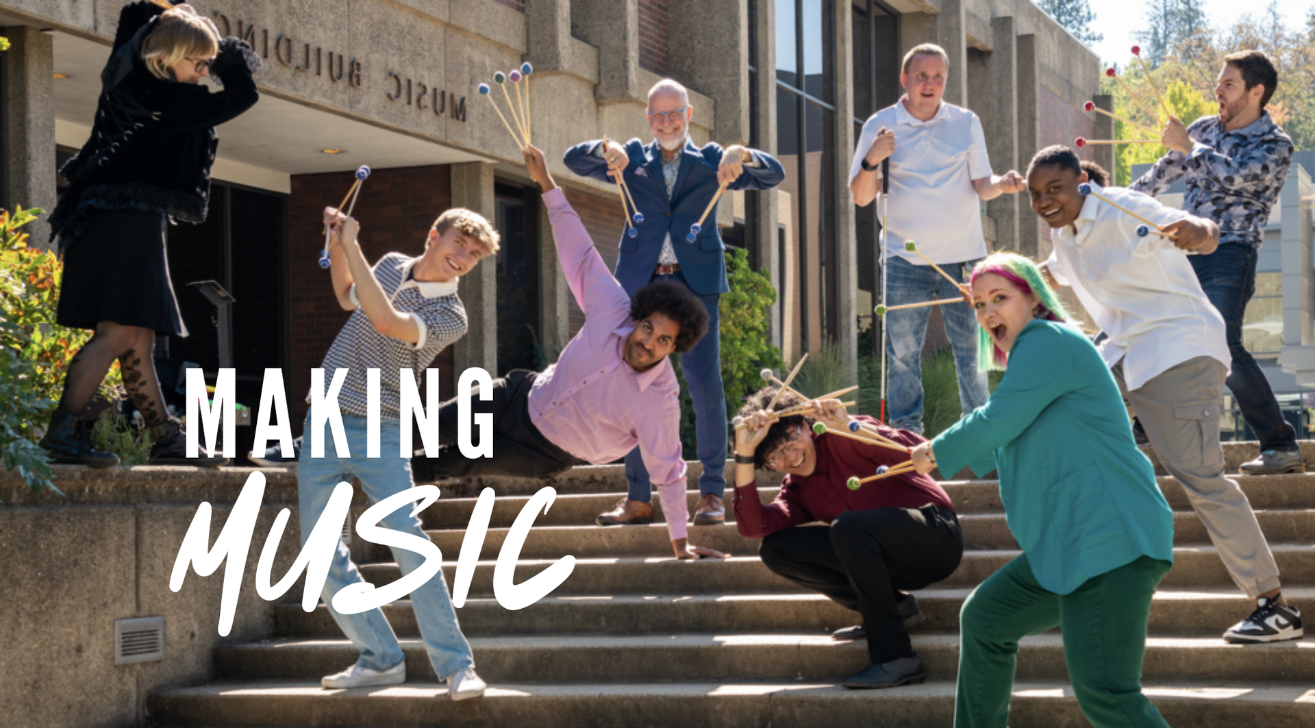 People on steps holding drumsticks and sticks, striking poses. Text: 