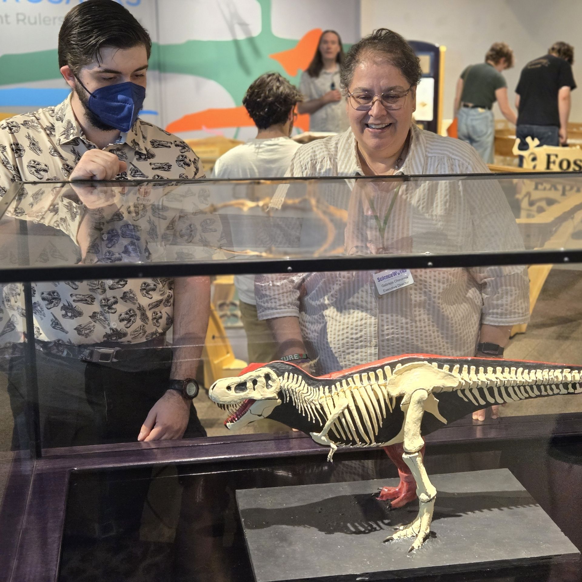Sculpture artist Drew Hogan (left) and Executive Director Gabriela Chavarria (right), at the opening reception of Paleoart Through Time.