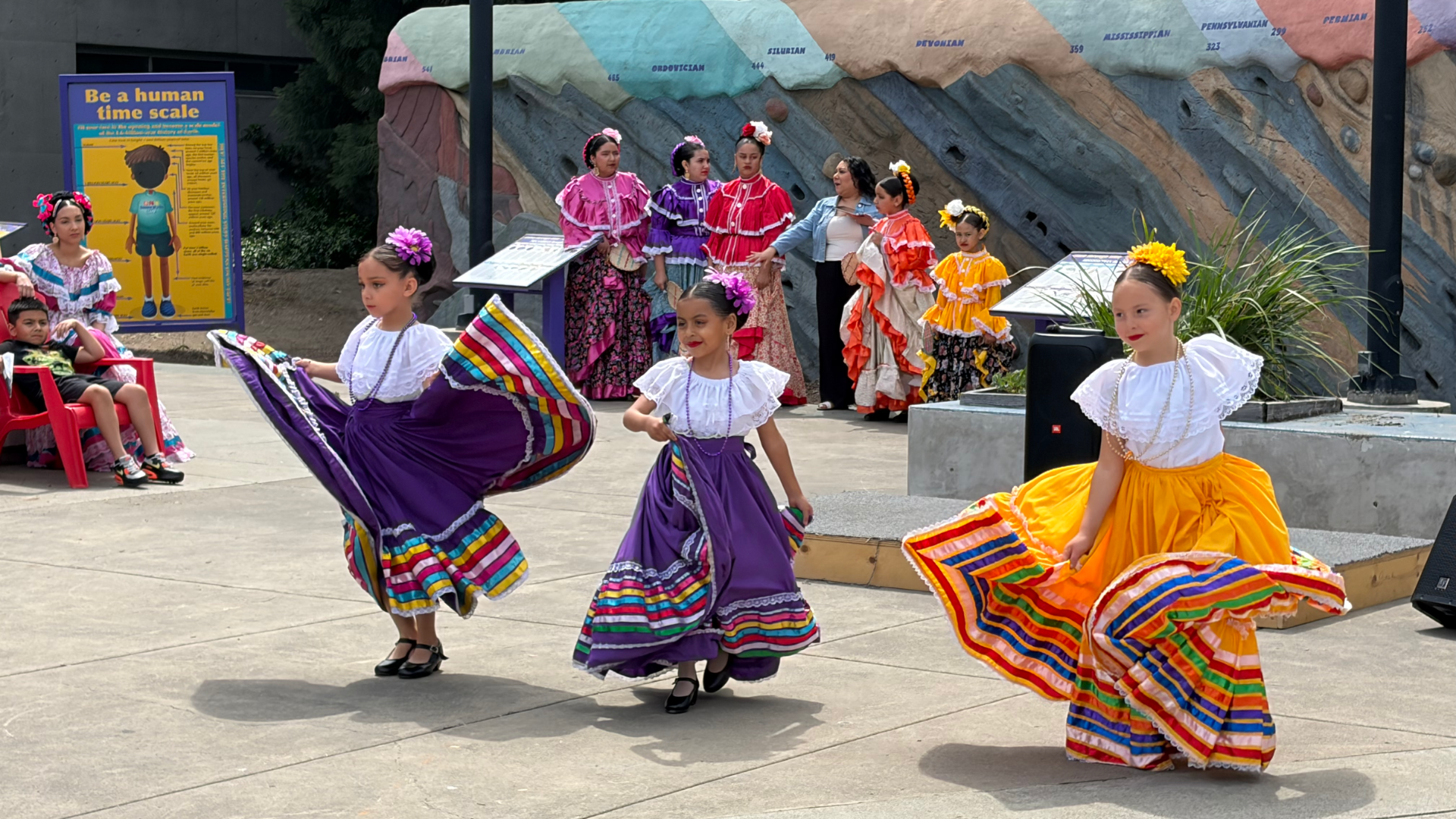 A group of dancers from Ballet Folklorico, Ritmo Alegre performs on the ScienceWorks Plaza