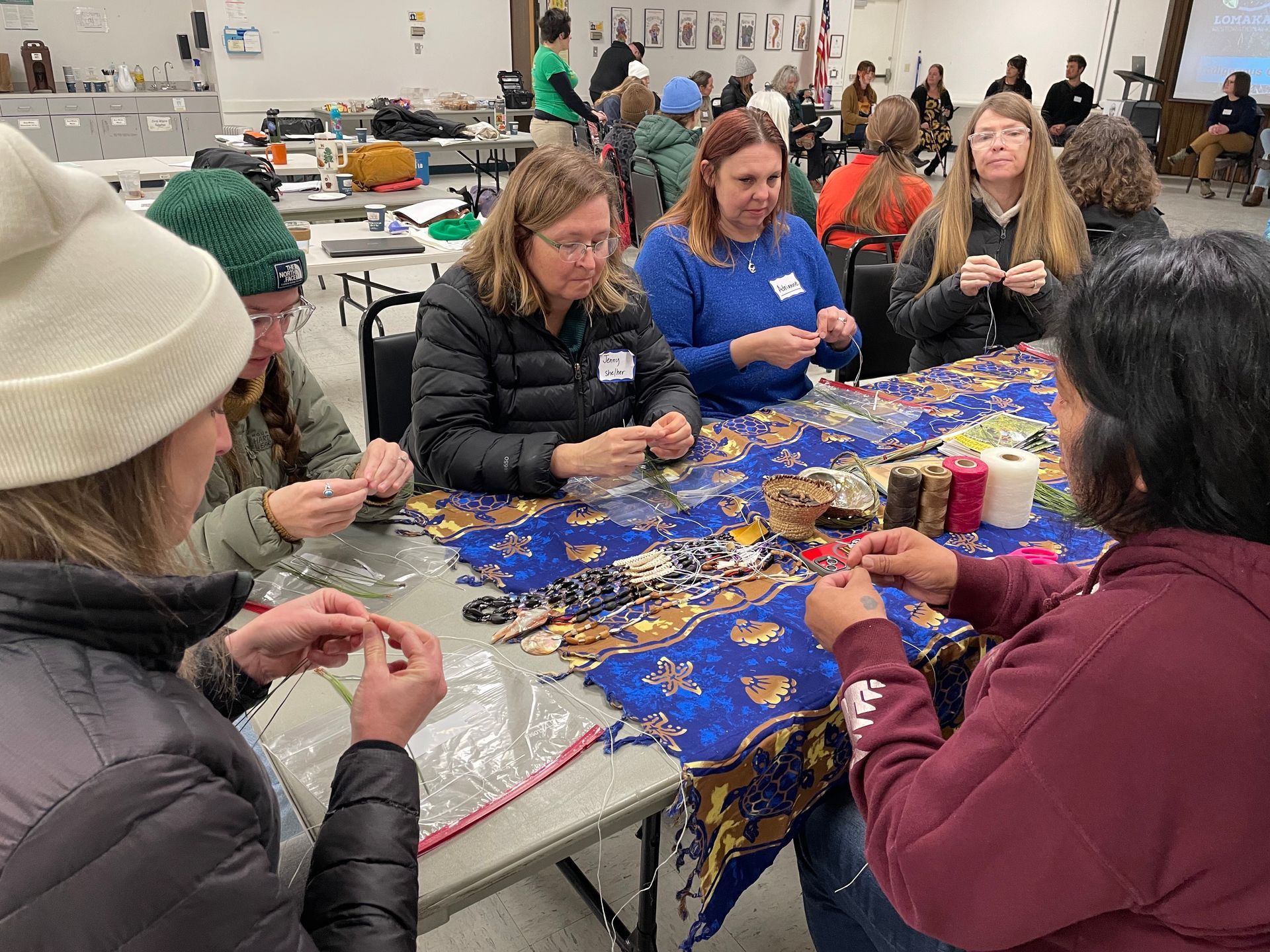 Teachers attending wildfire education training, February 2025. Basket weaving activity led by Virginia Amoroso. Photo by Jennifer Payne