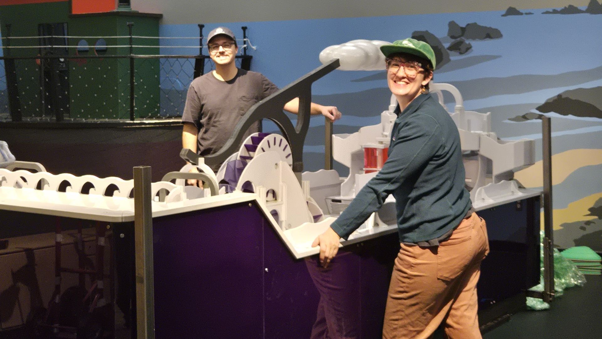 Addison and Liz unpack and install new water table in pacific crest cove