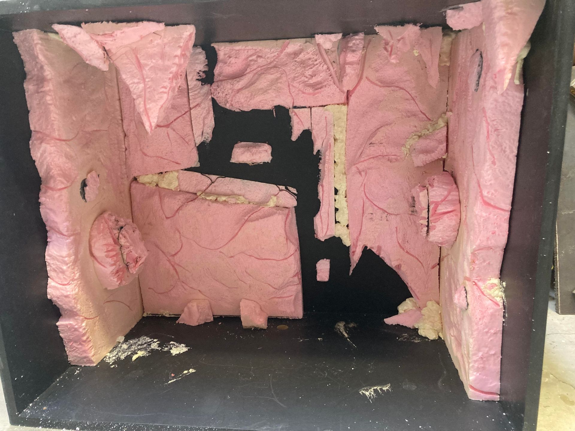 photo of a cave exhibit in process, this is the first stage, showing the raw pink foam