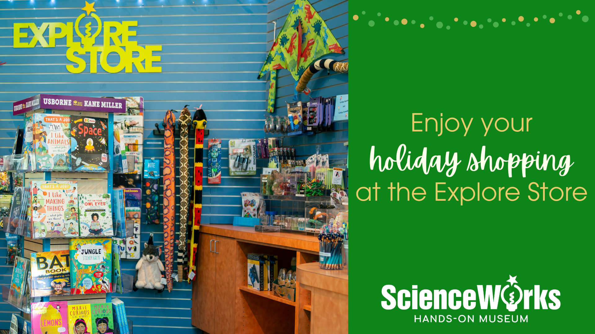 A photograph of items for sale at the explore store including books and stuffed animals.