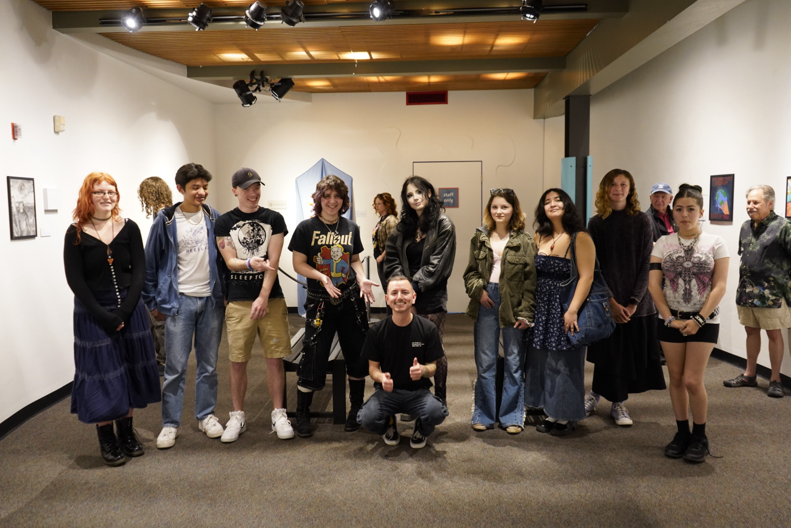 Teen artists posed for group photo at opening reception For Love of Nature