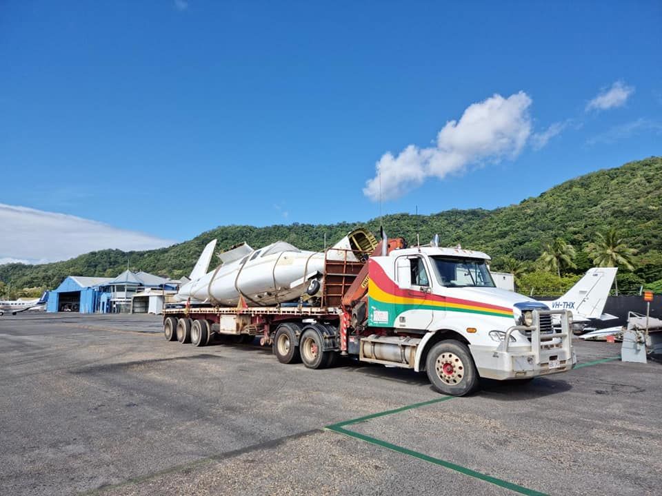 A Truck is Carrying a Large Object on a Trailer — Bell's Carrying & Crane Hire Service Pty Ltd in Normanton, QLD