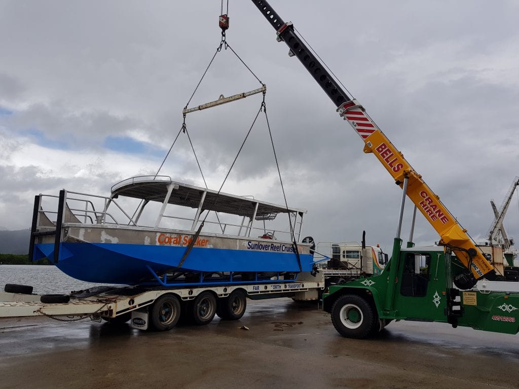 Crane Lift the Boat — Bell's Carrying & Crane Hire Service Pty Ltd in Bungalow, QLD