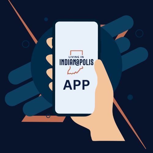 A hand is holding a cell phone with the indianapolis app on it.