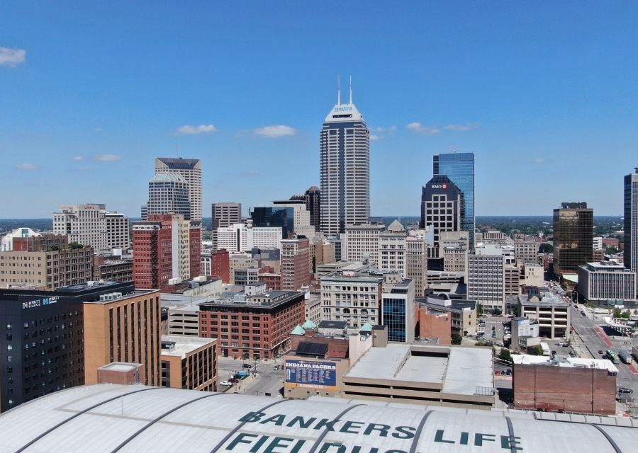 downtown Indianapolis daytime, Pros & cons of living in Indianapolis versus the suburbs downtown Indianapolis daytime, Pros & cons of living in Indianapolis versus the suburbs