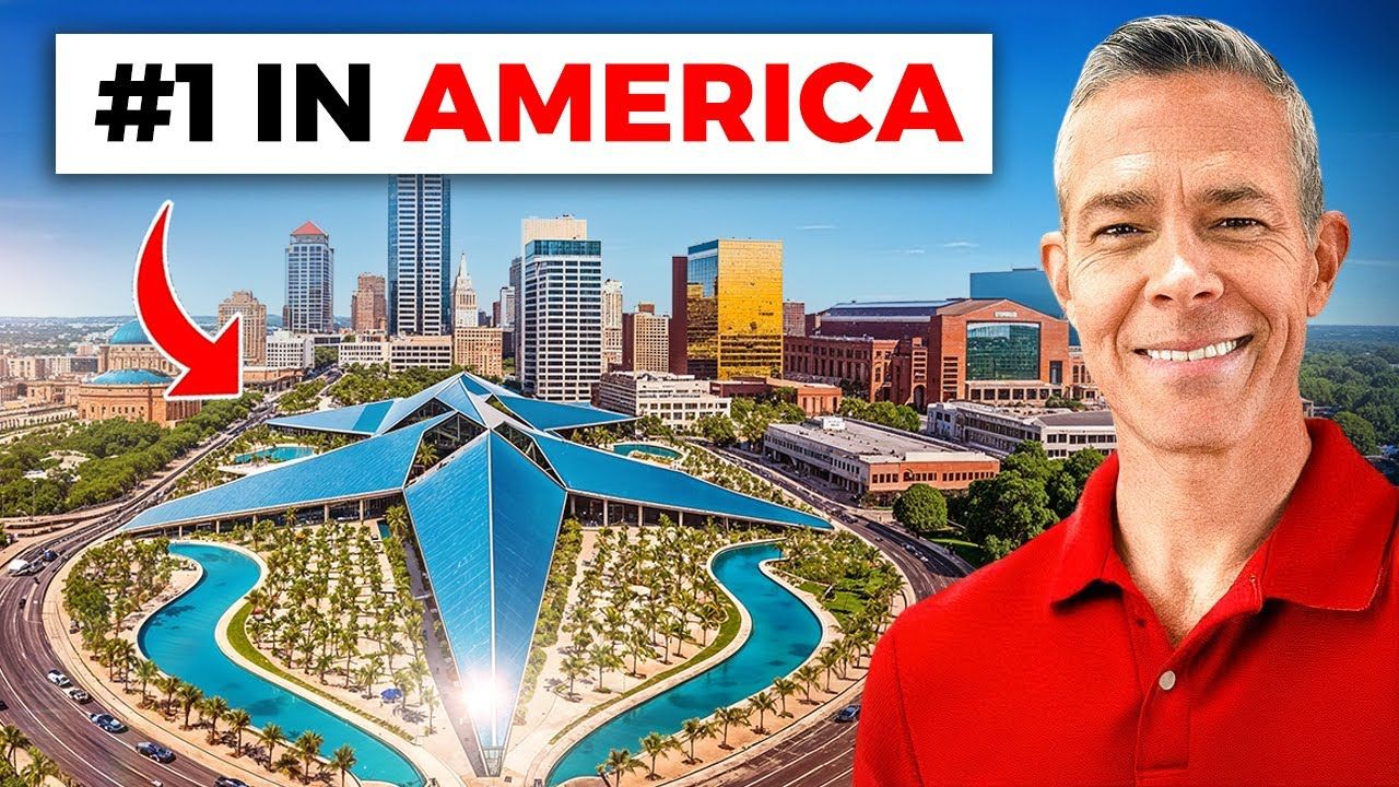 Man in red shirt smiling, next to city skyline. Text 