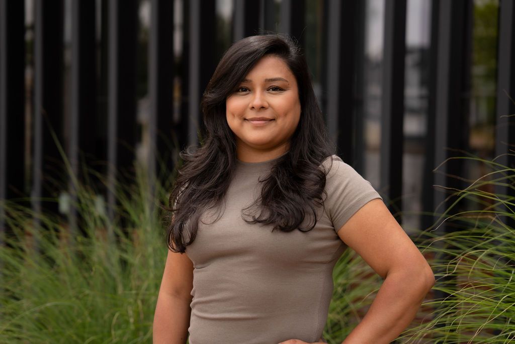 Diana Garcia standing confidently outside