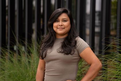 Diana Garcia standing confidently outside