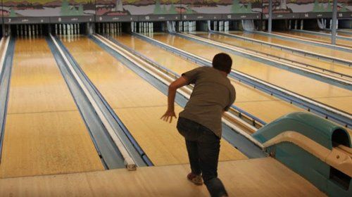 a person playing — Bowling Alley in Norwood, MA