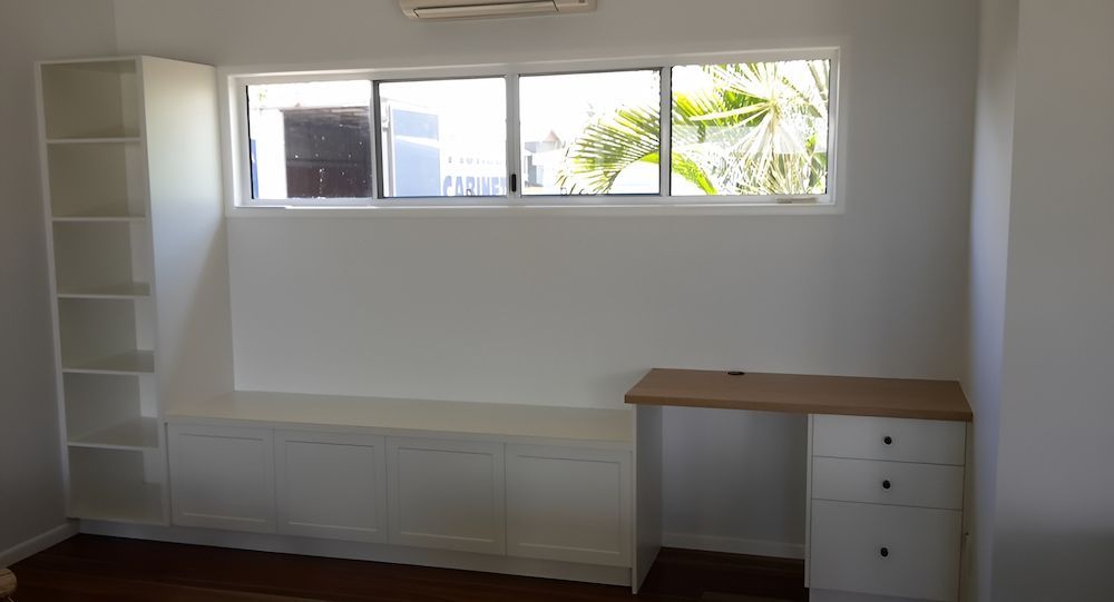 A Room With A Desk, Shelves And A Window — Pioneer Cabinets in Rural View, QLD