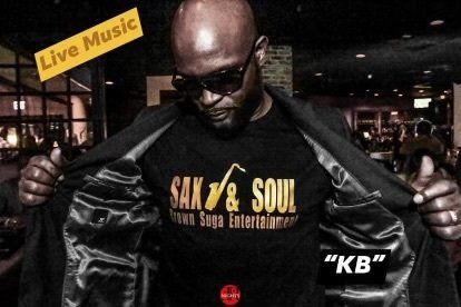 A man is wearing a shirt that says sax & soul