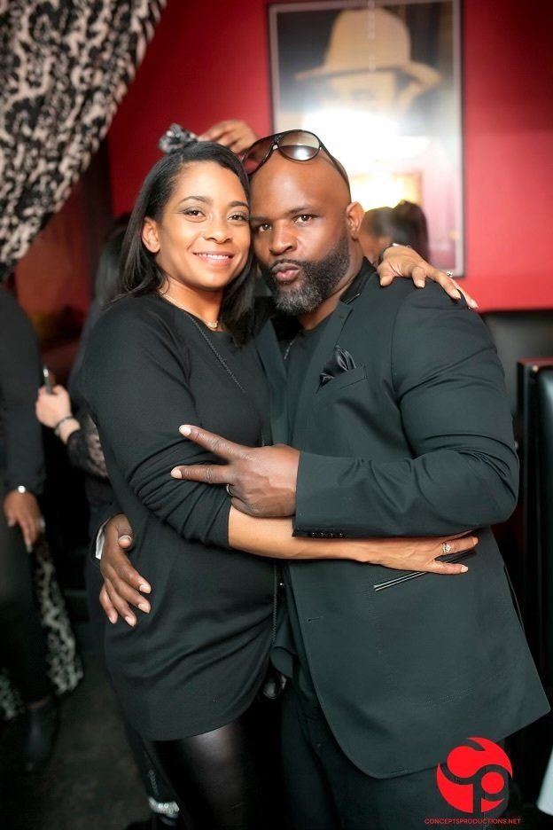A man and a woman are posing for a picture together