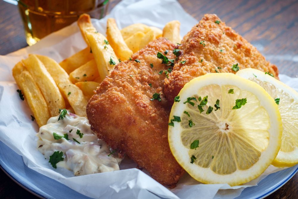 Salmon Fillet with Spinach, Lemon Slices and Juice — Mount Louisa Snack Bar in Mount Louisa, QLD