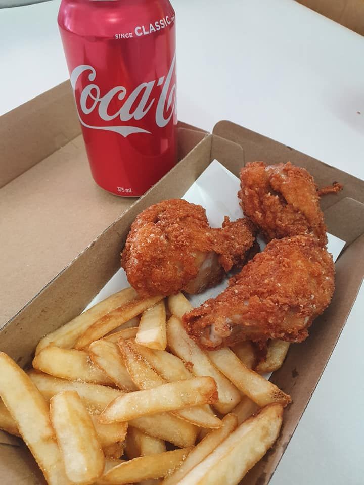 Fried Chicken and Fries in A Box with A Can of Coca-Cola — Mount Louisa Snack Bar in Mount Louisa, QLD