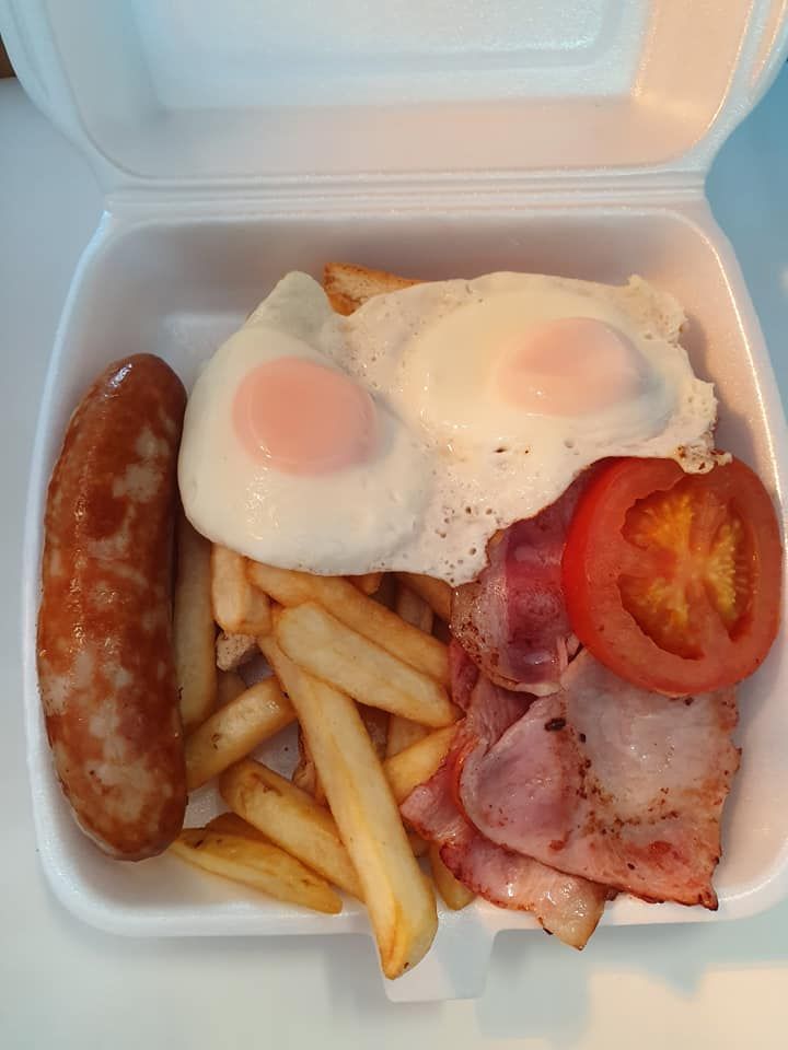 Breakfast in A White Container: Fried Eggs, Sausage, Fries, Bacon and Tomato — Mount Louisa Snack Bar in Mount Louisa, QLD