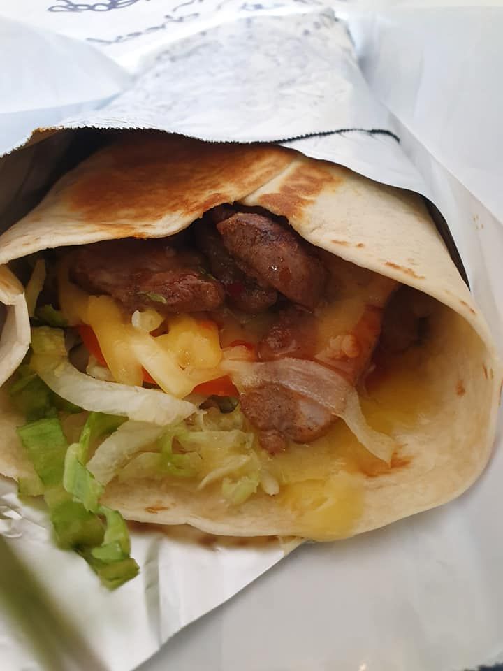 Wrap Containing Meat, Cheese, Lettuce and Onions — Mount Louisa Snack Bar in Mount Louisa, QLD
